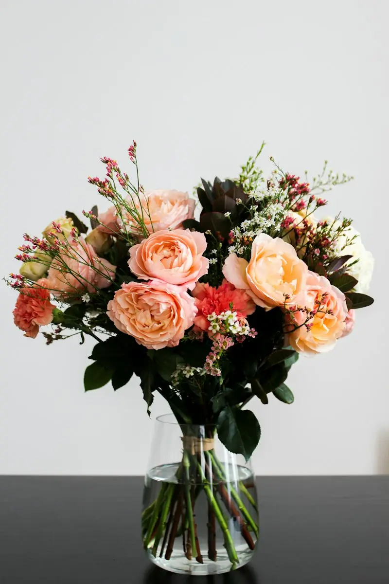 Peach and pink flower arrangement by Zeenshane Flowershop